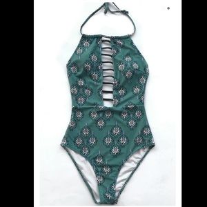 Green floral patterned one-piece swimsuit